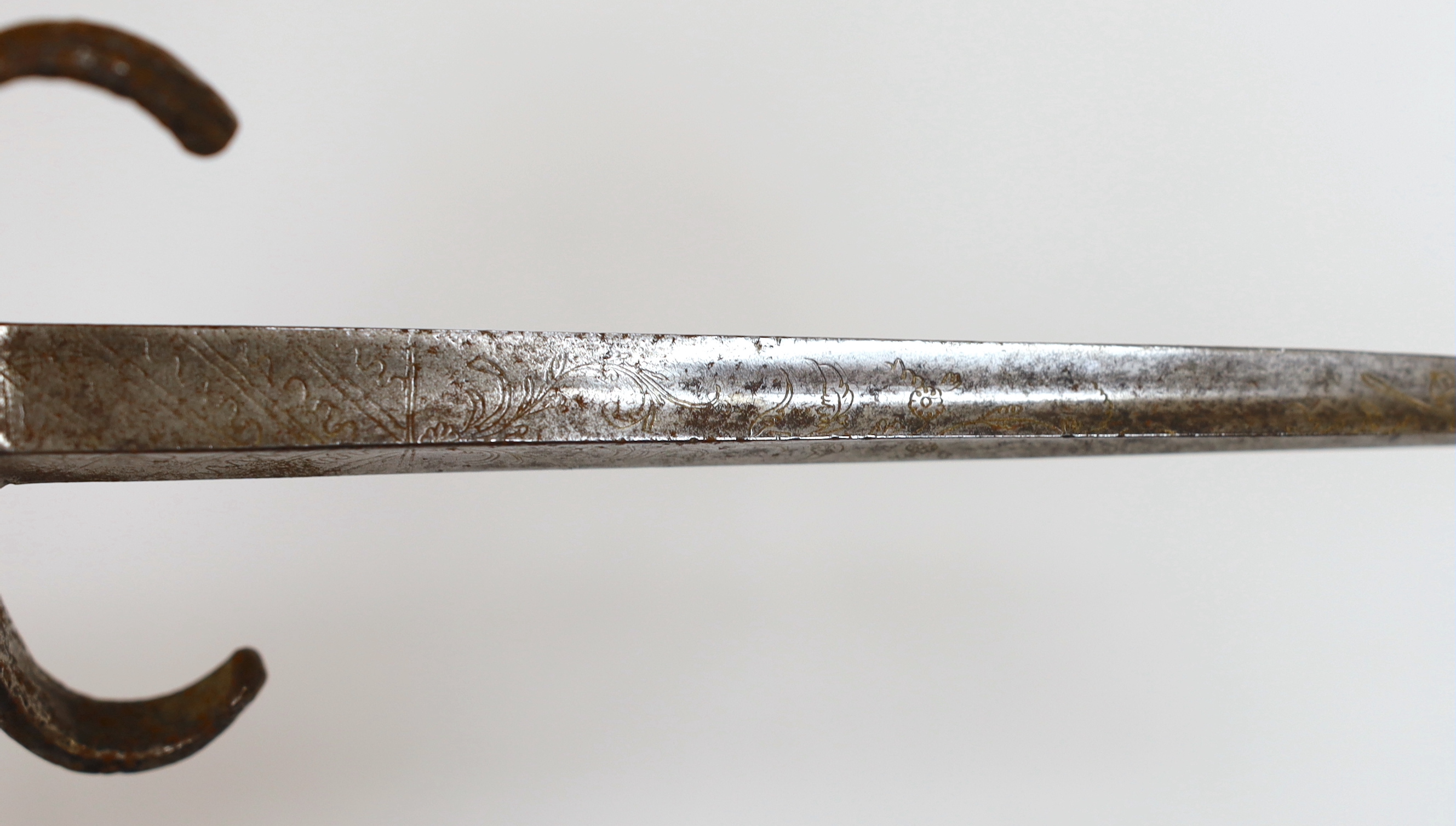 A reproduction stiletto and dagger, stiletto with engraved steel blade, steel pommel and quillon, and wire grip, longest 35.5cm